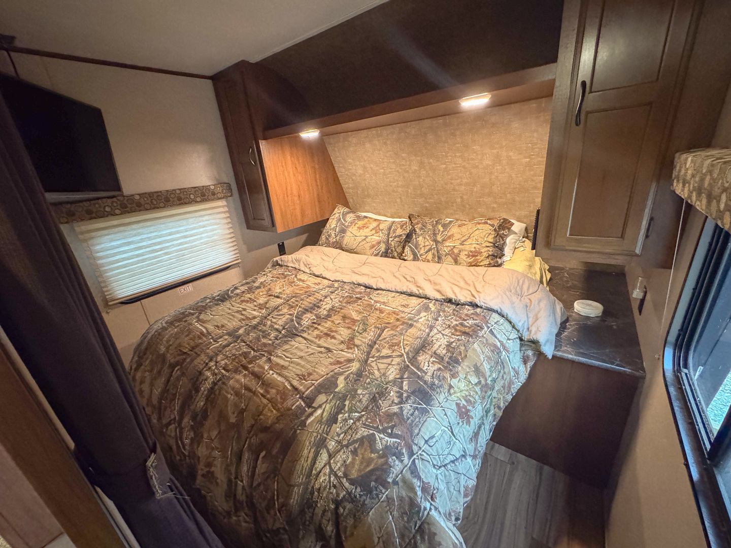 22-103 Woodhaven Sublette, IL 61367 - Photo 15 of 18 a bed sitting in a bedroom next to a window