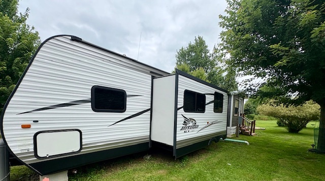 22-103 Woodhaven Sublette, IL 61367 - Photo 3 of 18 a view of a house with a backyard