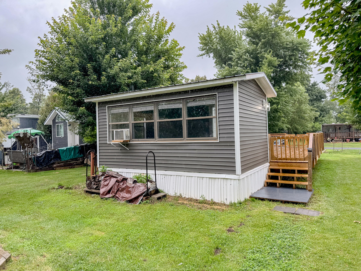22-103 Woodhaven Sublette, IL 61367 - Photo 5 of 18 a backyard of a house with barbeque oven