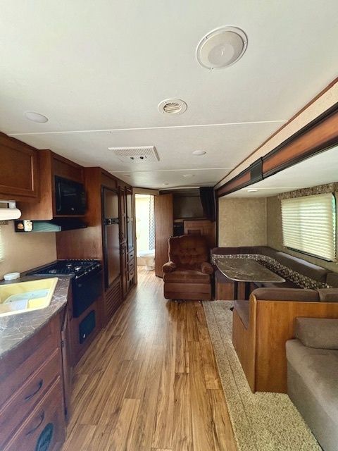 22-103 Woodhaven Sublette, IL 61367 - Photo 7 of 18 a kitchen with stainless steel appliances granite countertop a stove and a refrigerator