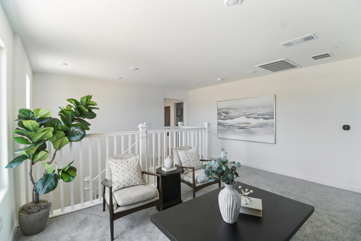 1108 Ashera Street Rocklin, CA 95765 - Photo 16 of 27 a living room with furniture flowerpot and wooden floor