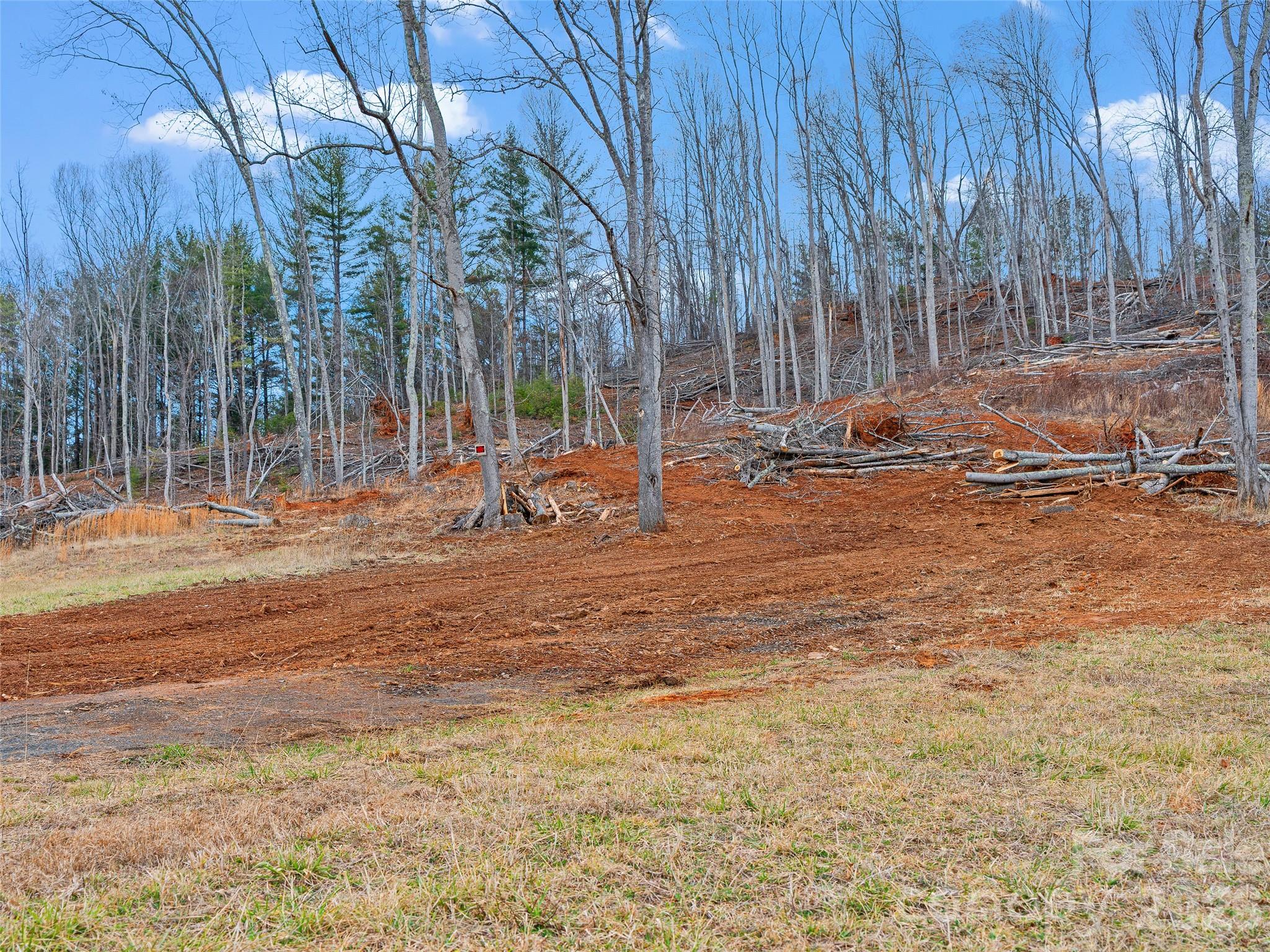 784 Green Young Cemetery Road Bakersville, NC 28705 - Photo 36 of 46 a view of a patio with table and chairs and couches with wooden fence