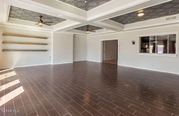 a kitchen with a stove and a refrigerator