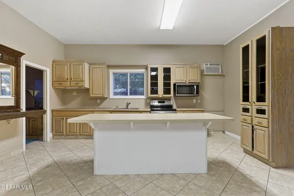 an aerial view of residential house with outdoor space and street view