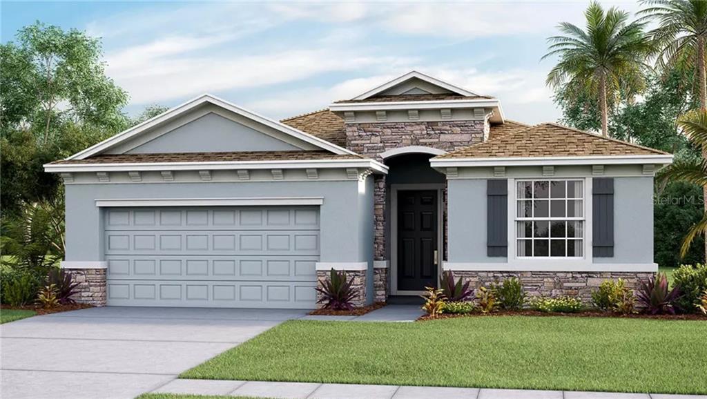 5145 Flowing Oar Road Wimauma, FL 33598 - Photo 1 of 1 a front view of a house with a yard