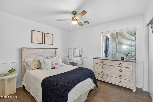 a view of kitchen with furniture and wooden floor