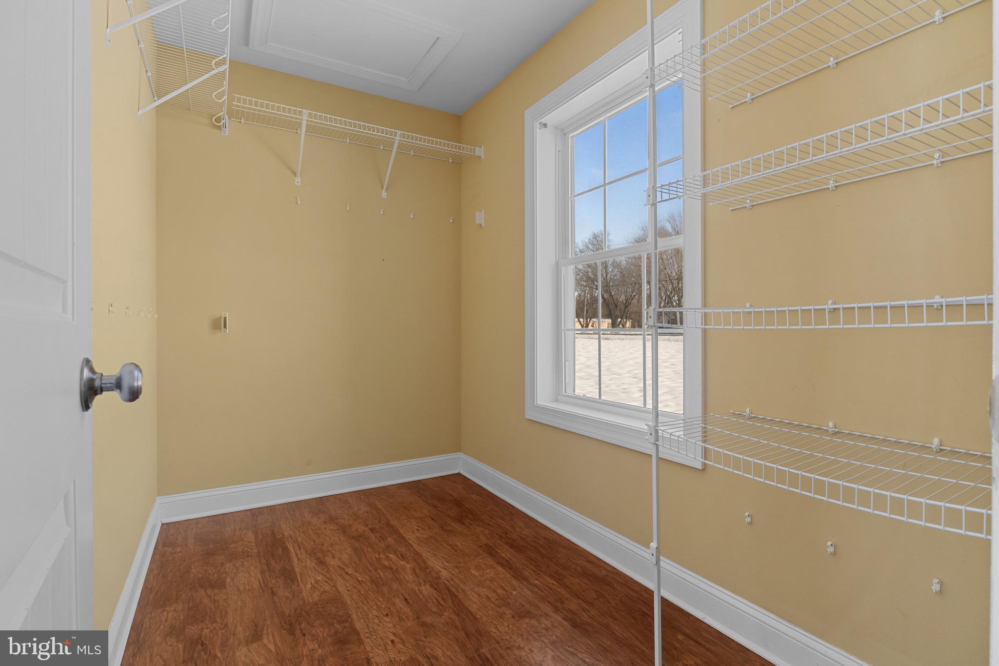 7180 Shawnee Road Milford, DE 19963 - Photo 20 of 20 a view of an empty room with a window