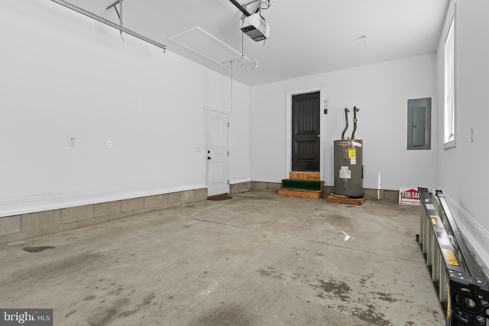 7180 Shawnee Road Milford, DE 19963 - Photo 9 of 20 a view of a livingroom with wooden floor and a ceiling fan
