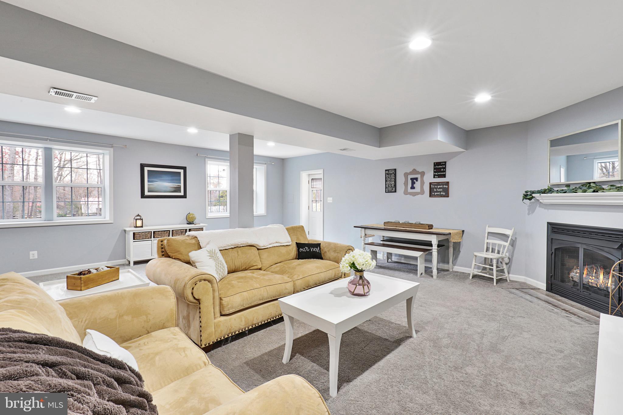 7388 Kennedy Road Nokesville, VA 20181 - Photo 25 of 41 basement family room w/ fireplace