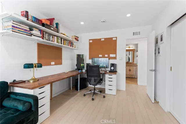 a view of a workspace with furniture