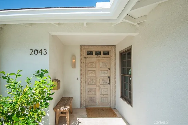 a view of front door with yellow door