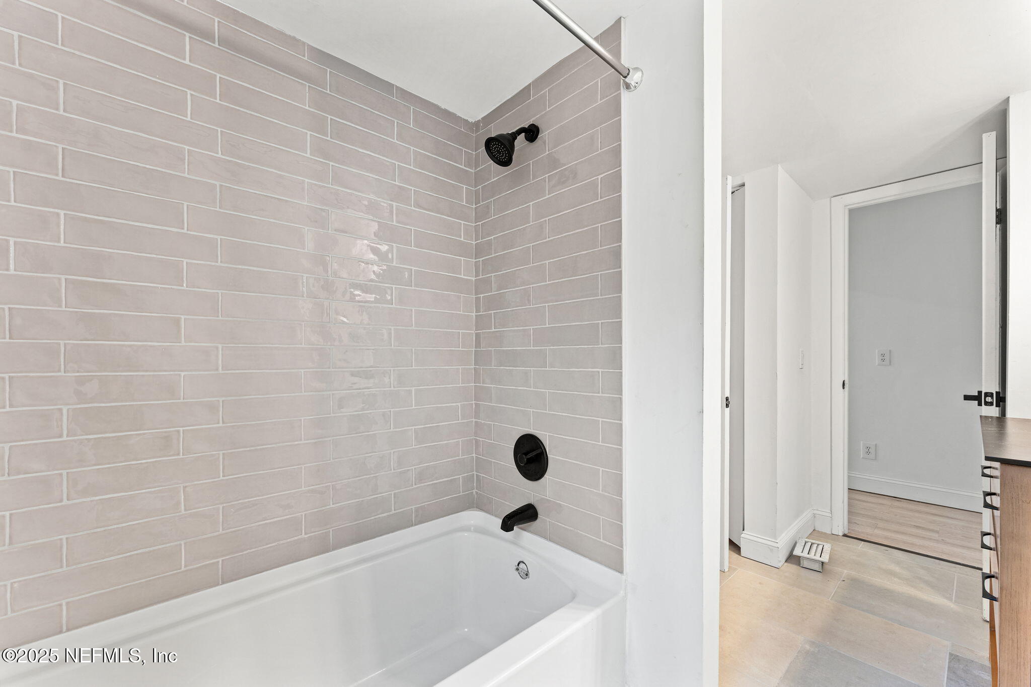 6211 Firestone Road Jacksonville, FL 32244 - Photo 25 of 41 a bathroom with a tub
