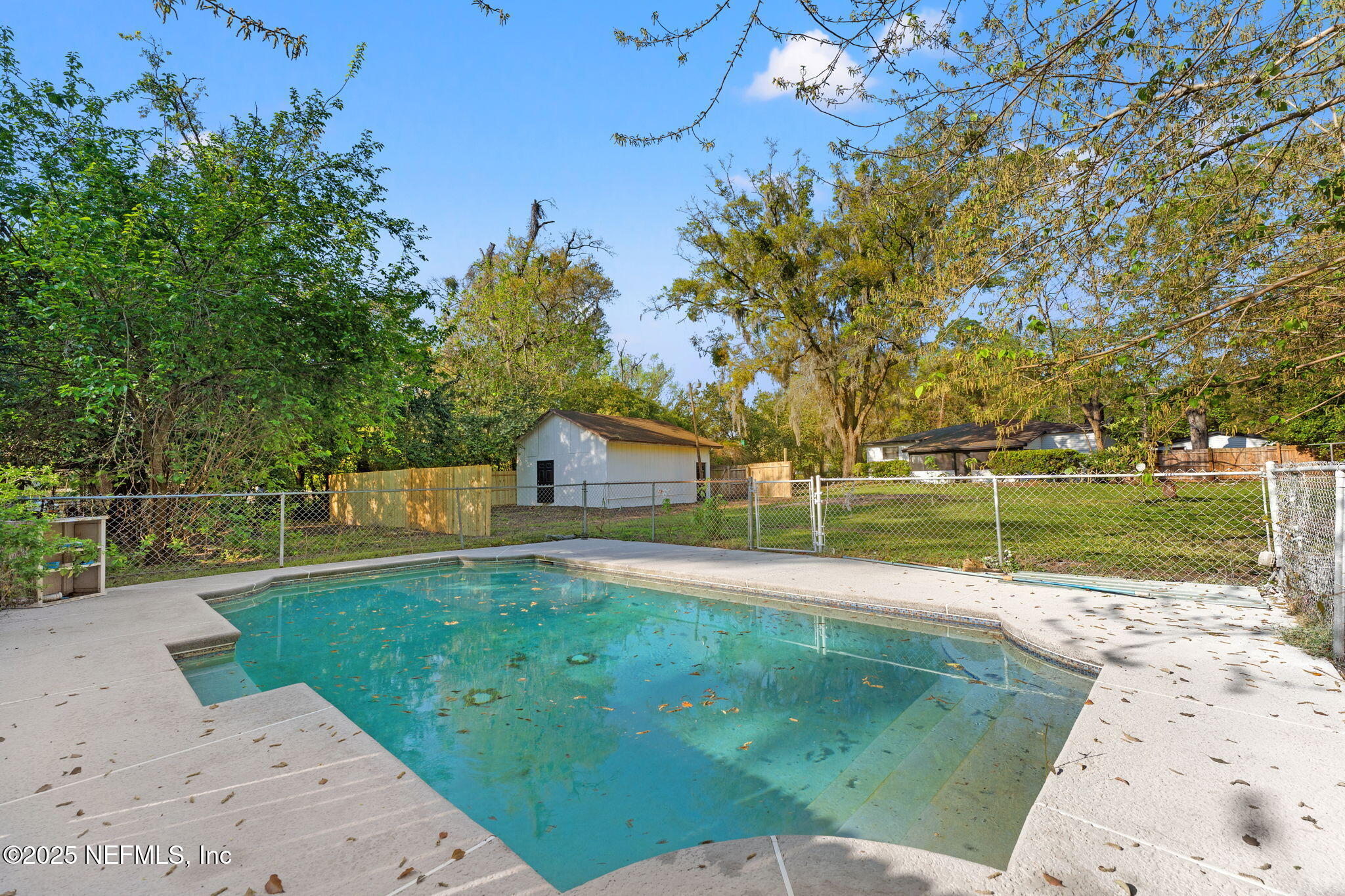 6211 Firestone Road Jacksonville, FL 32244 - Photo 29 of 41 a view of a house with a yard
