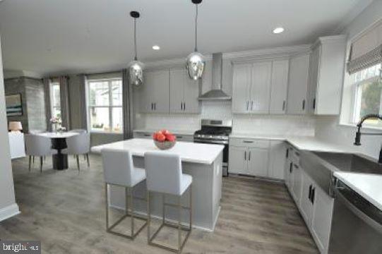 1407 Wheaton Lane Silver Spring, MD 20902 - Photo 8 of 17 SPACIOUS KITCHEN HAS BREAKFAST BAR