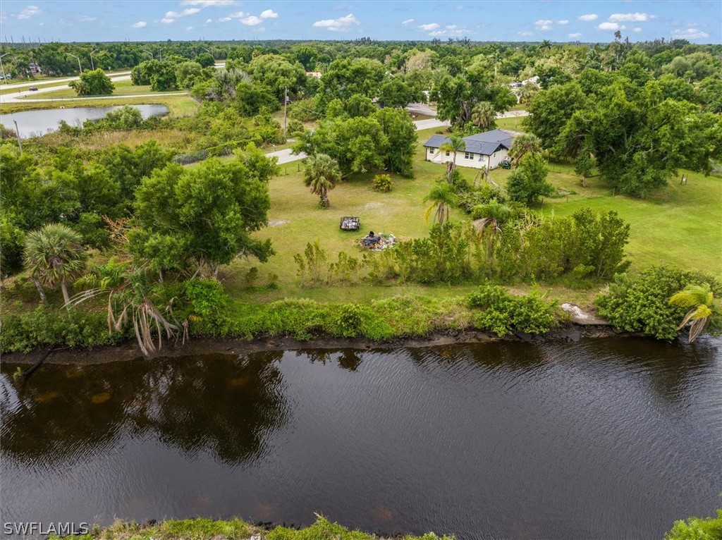 8602 Riverside Drive Punta Gorda, FL 33982 - Photo 9 of 13 a view of a lake with houses