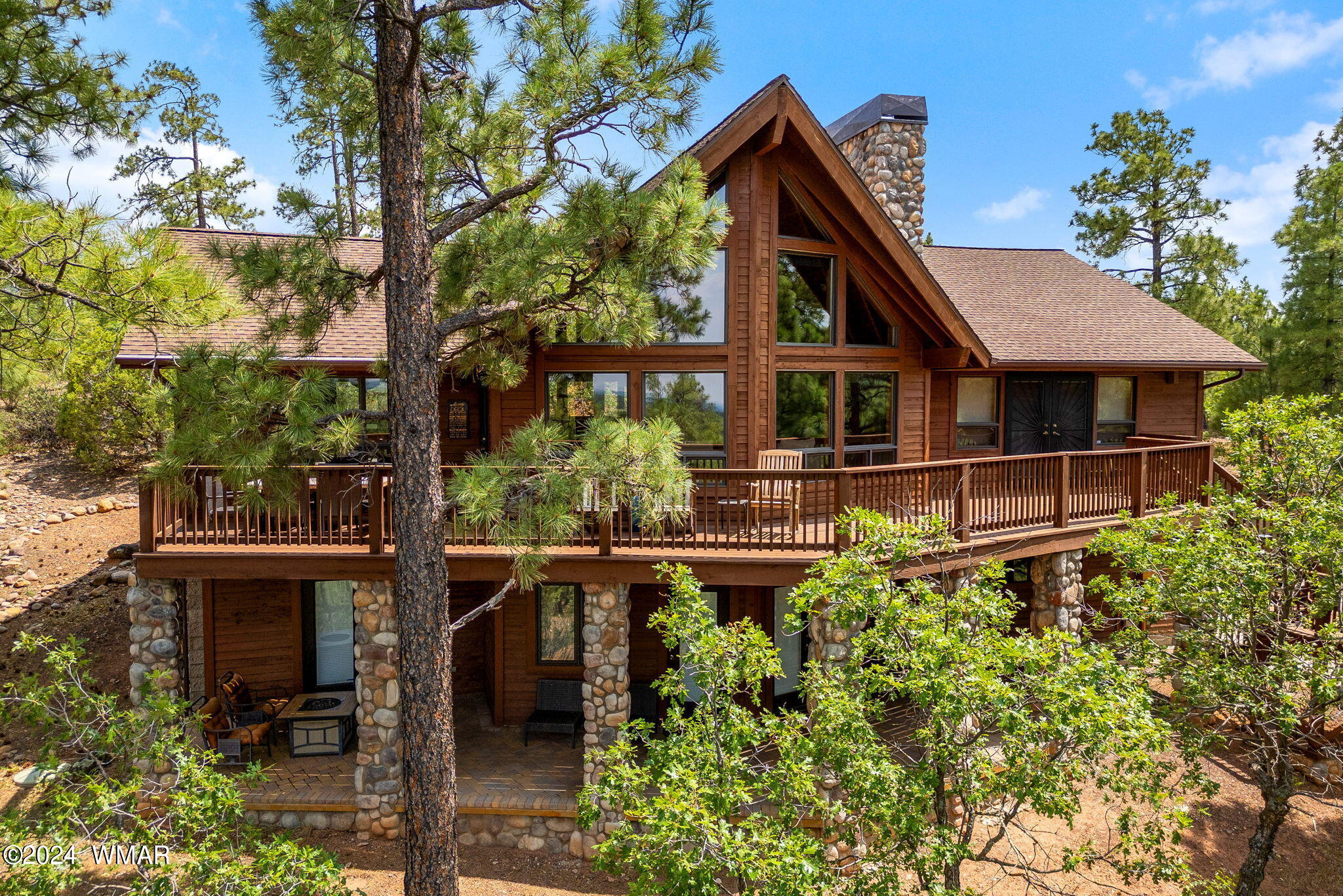 3361 West Falling Leaf Road Show Low, AZ 85901 - Photo 1 of 49 Torreon cabin perched on the hilltop, offering unparalleled, breathtaking views of Show Low.