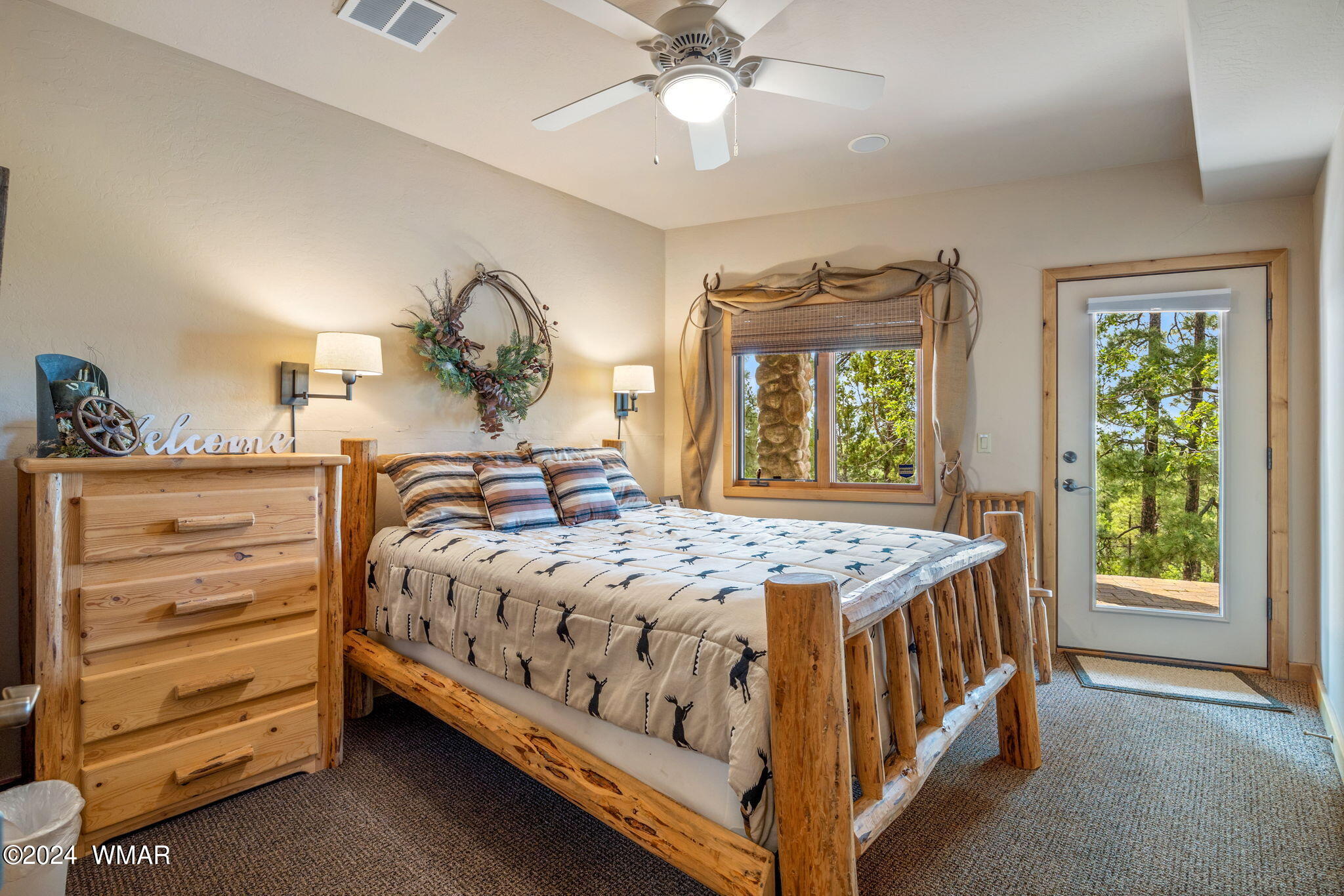 3361 West Falling Leaf Road Show Low, AZ 85901 - Photo 23 of 49 Guest bedroom with views and access to the deck.