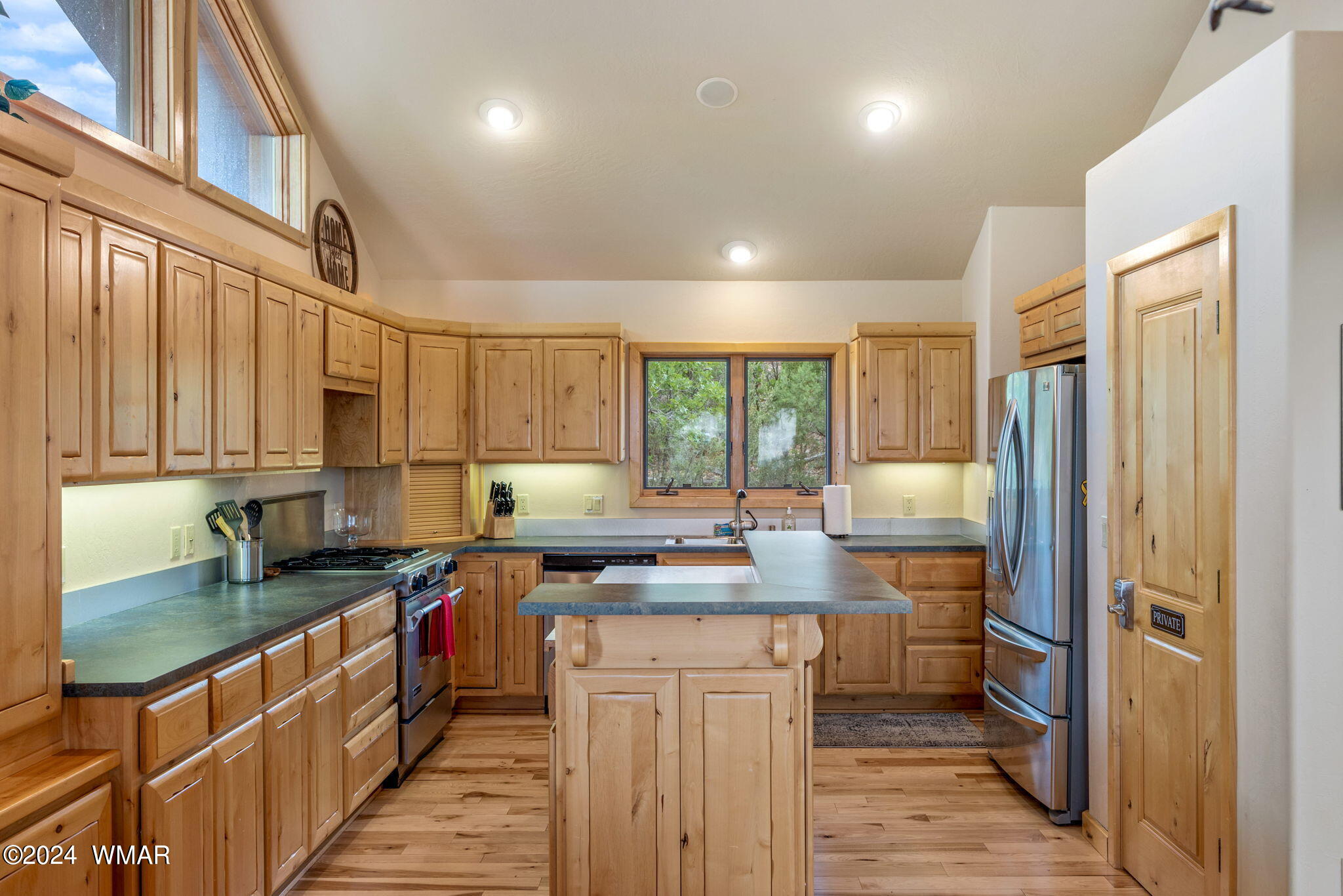 3361 West Falling Leaf Road Show Low, AZ 85901 - Photo 7 of 49 Beautiful cabinetry and with stainless steel appliances.