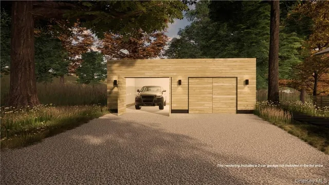 a view of a house with backyard and garden