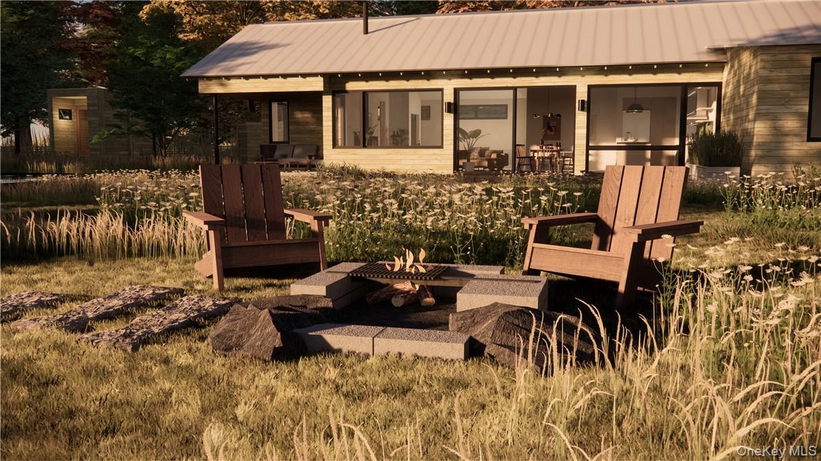 14 Red Rock Road Wawarsing, NY 12489 - Photo 5 of 23 a view of a patio with table and chairs with wooden floor and fence