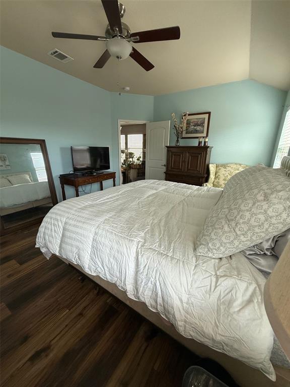 120 Chalk Road Anna, TX 75409 - Photo 18 of 29 a bedroom with a bed and wooden floor
