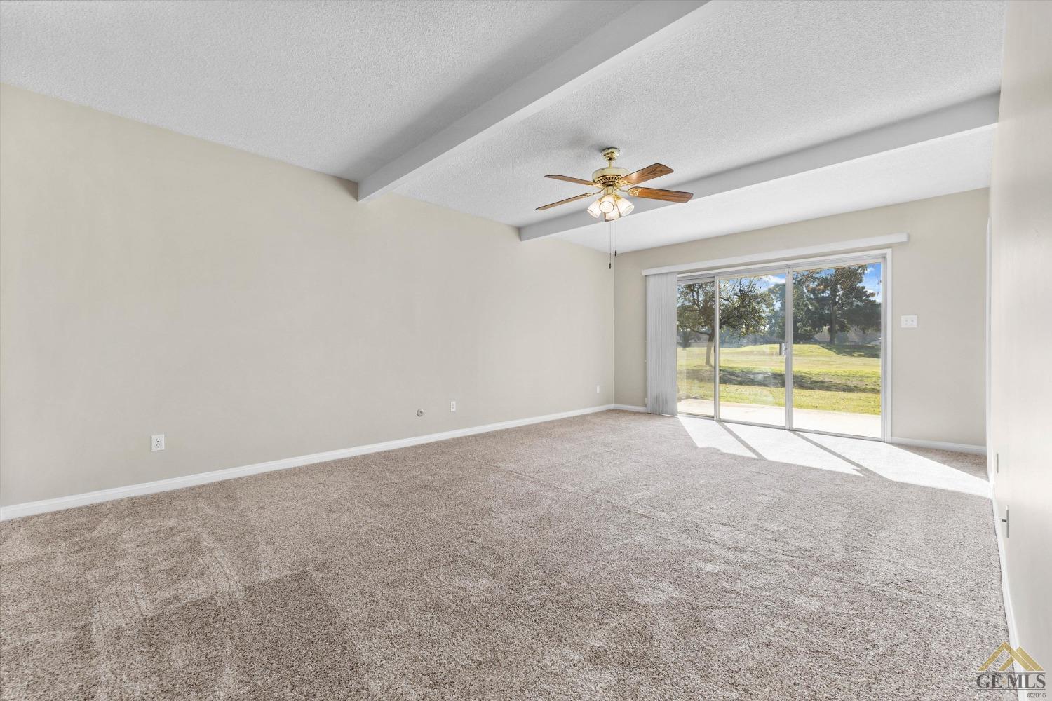 Undisclosed Address Bakersfield, CA 93309 - Photo 25 of 32 a view of an empty room with a window