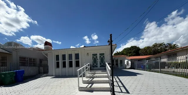 a view of a porch with furniture