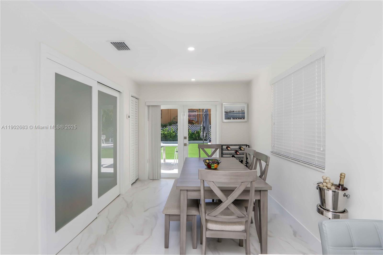 1030 Southwest 10th Avenue Miami, FL 33130 - Photo 12 of 30 a view of a dining room with furniture and window