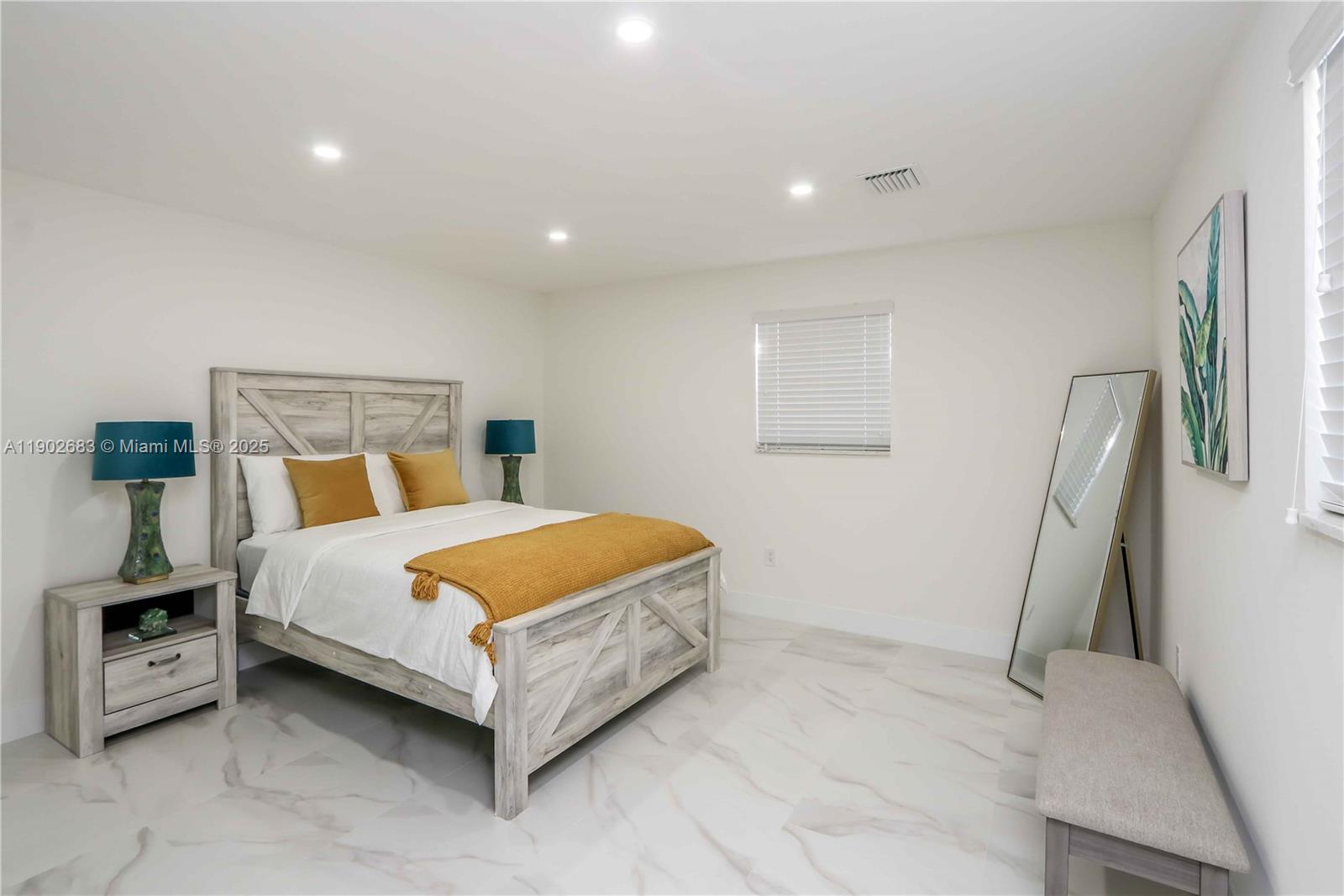 1030 Southwest 10th Avenue Miami, FL 33130 - Photo 14 of 30 a bedroom with a bed and a walk in closet