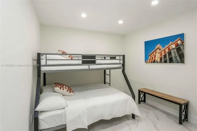 a room with a table and chairs