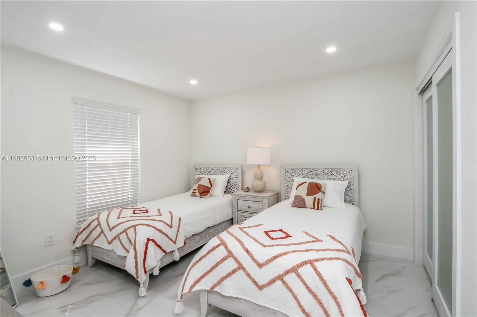 1030 Southwest 10th Avenue Miami, FL 33130 - Photo 22 of 30 a bedroom with two beds and a couch