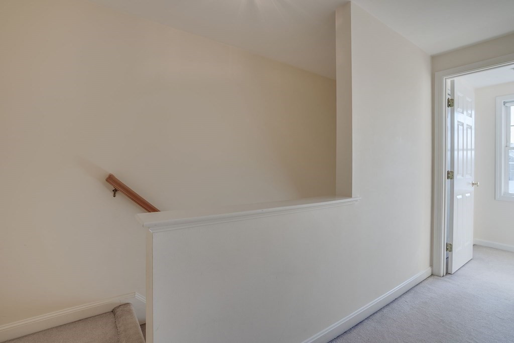 985 Trapelo Road, Unit 22 Waltham, MA 02452 - Photo 11 of 29 a view of a hallway
