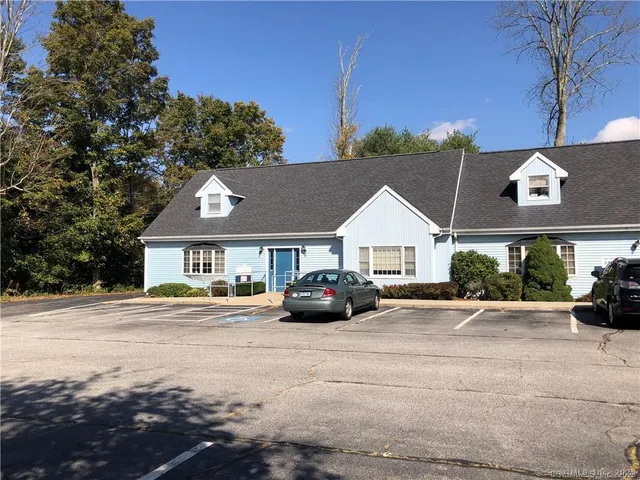 a car parked in front of a house