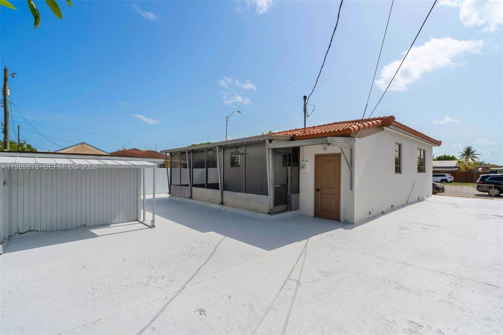 4485 East 8th Avenue Hialeah, FL 33013 - Photo 21 of 26 a view of a house with a backyard