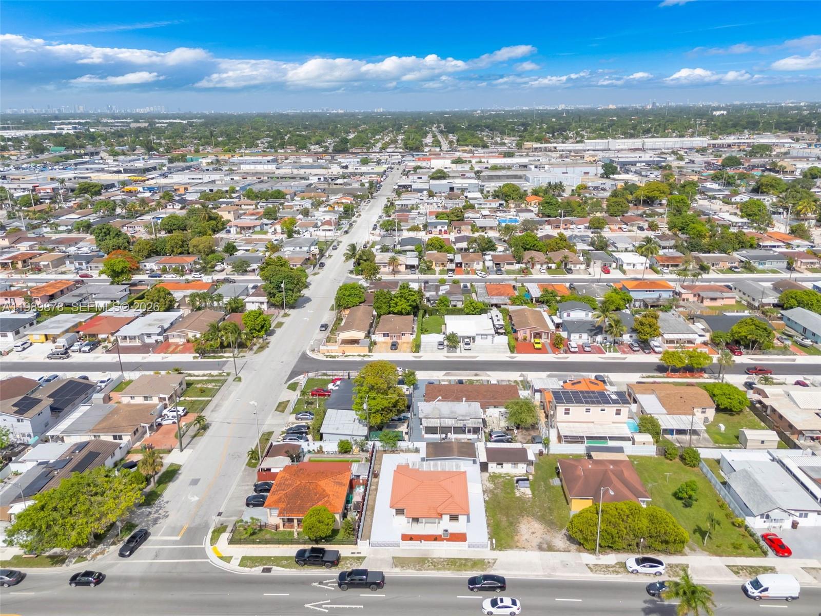 4485 East 8th Avenue Hialeah, FL 33013 - Photo 22 of 26 an aerial view of residential houses with outdoor space