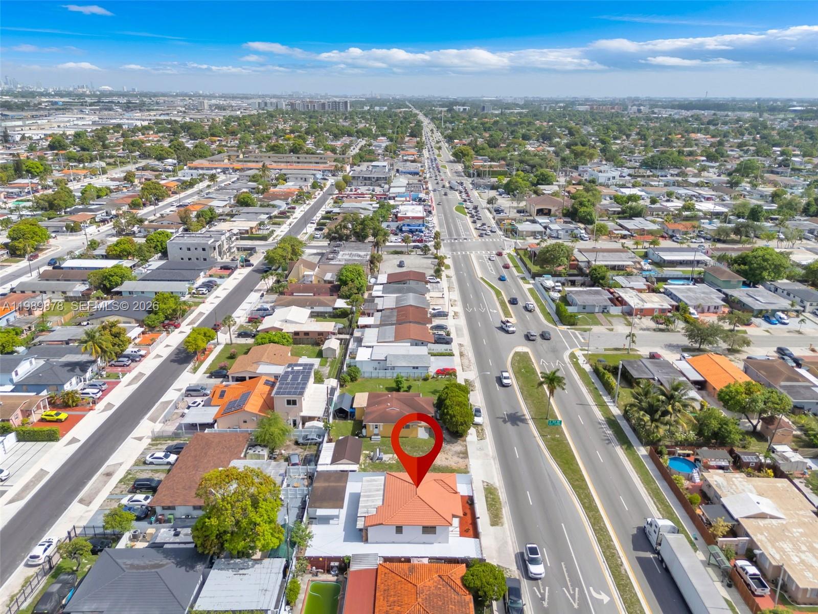 4485 East 8th Avenue Hialeah, FL 33013 - Photo 25 of 26 an aerial view of residential houses with outdoor space