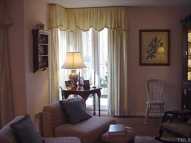 51 Stoneridge Road Durham, NC 27705 - Photo 5 of 10 a living room with furniture and a window
