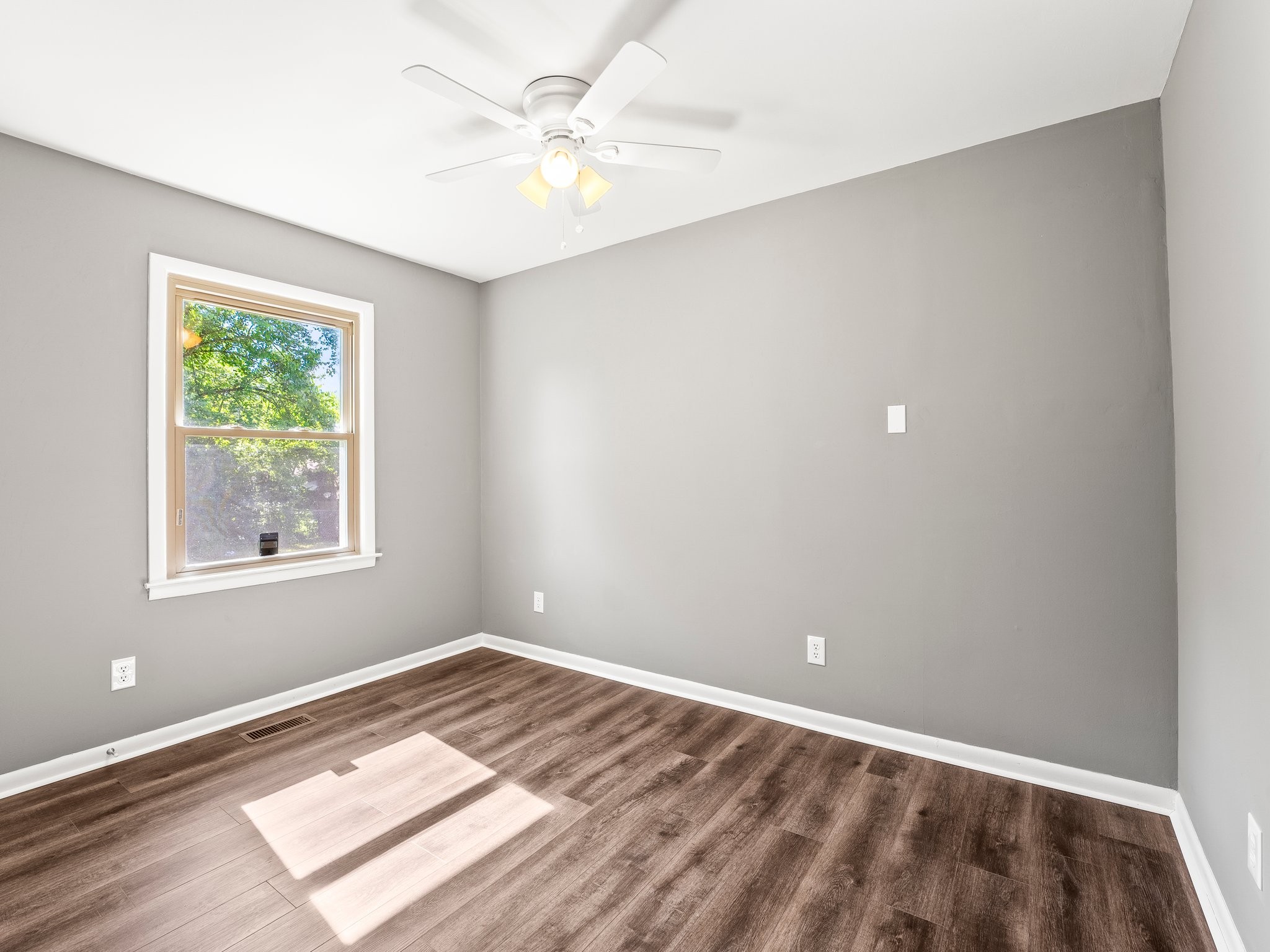 103 Cedar Street Huntland, TN 37345 - Photo 21 of 26 an empty room with a window