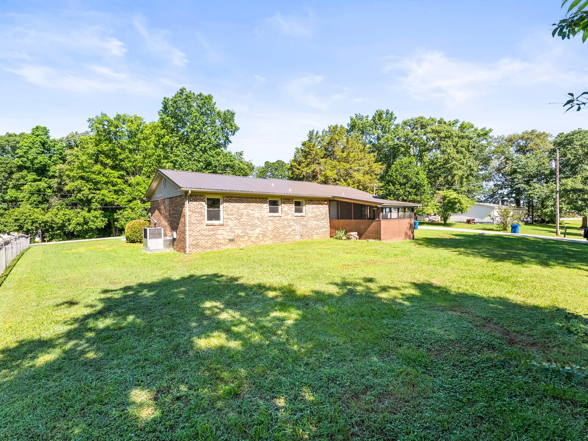 103 Cedar Street Huntland, TN 37345 - Photo 26 of 26 a front view of a house with garden