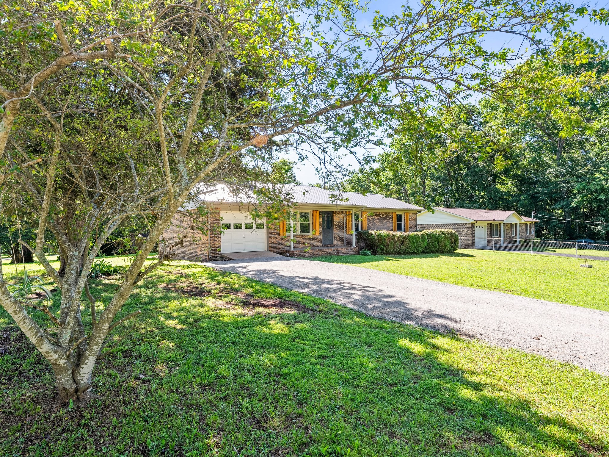 103 Cedar Street Huntland, TN 37345 - Photo 4 of 26 a view of a house with a yard