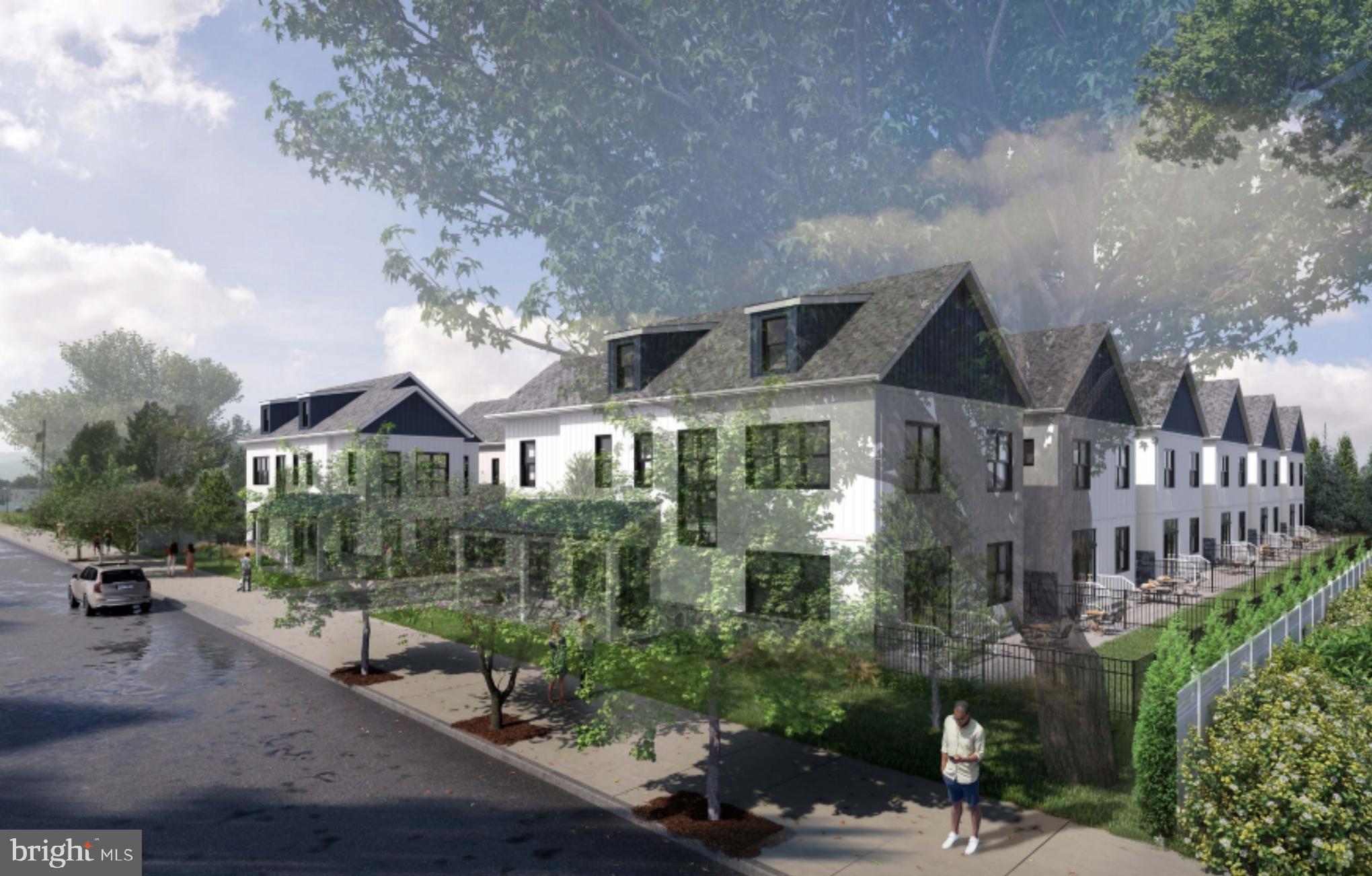 7330 Ridge Avenue Philadelphia, PA 19128 - Photo 2 of 15 a front view of a house with a yard