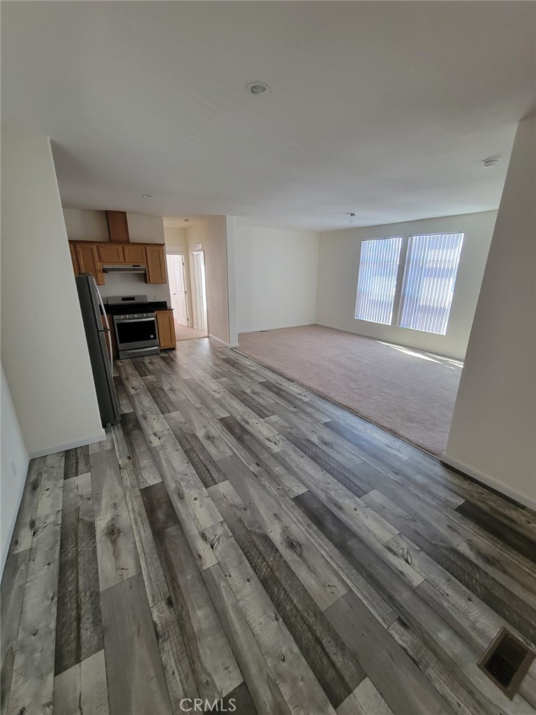 55 Pacifica Avenue, Unit 77 Bay Point, CA 94565 - Photo 5 of 10 a bedroom with a bed and a window