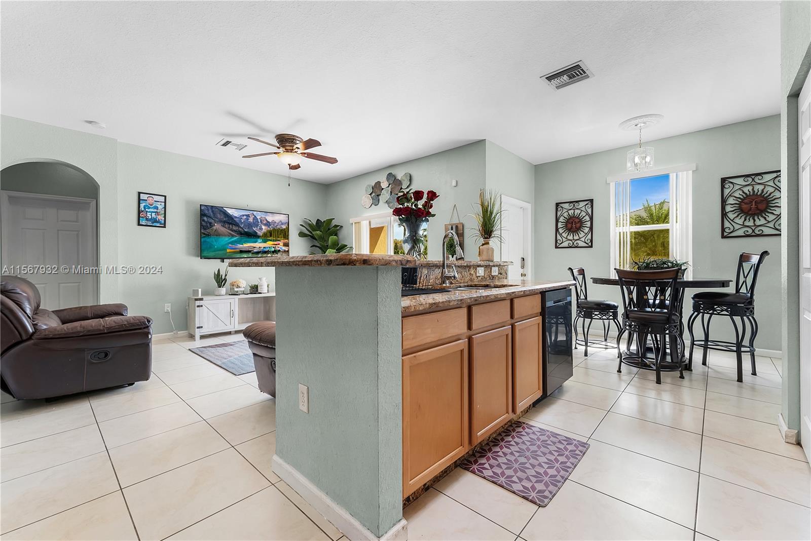 657 Southeast 30th Terrace Homestead, FL 33033 - Photo 11 of 53 a kitchen with a cabinets and counter space