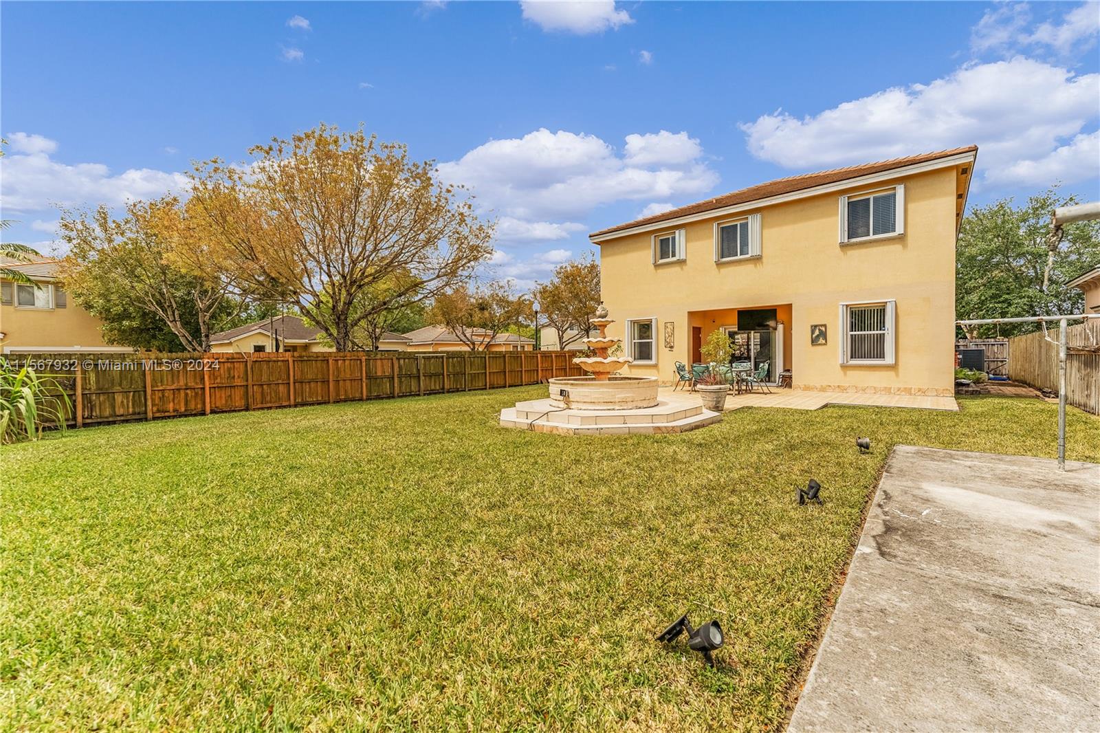 657 Southeast 30th Terrace Homestead, FL 33033 - Photo 36 of 53 a view of a house with backyard and sitting area