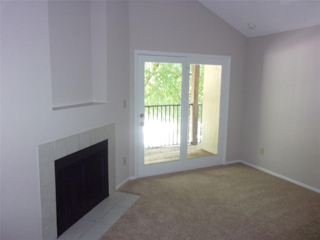 246 Afton Square, Unit 304 Altamonte Springs, FL 32714 - Photo 5 of 18 a view of an empty room with a window