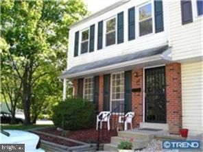 48 Fleming Street Newark, DE 19713 - Photo 1 of 6 a front view of a house with garden