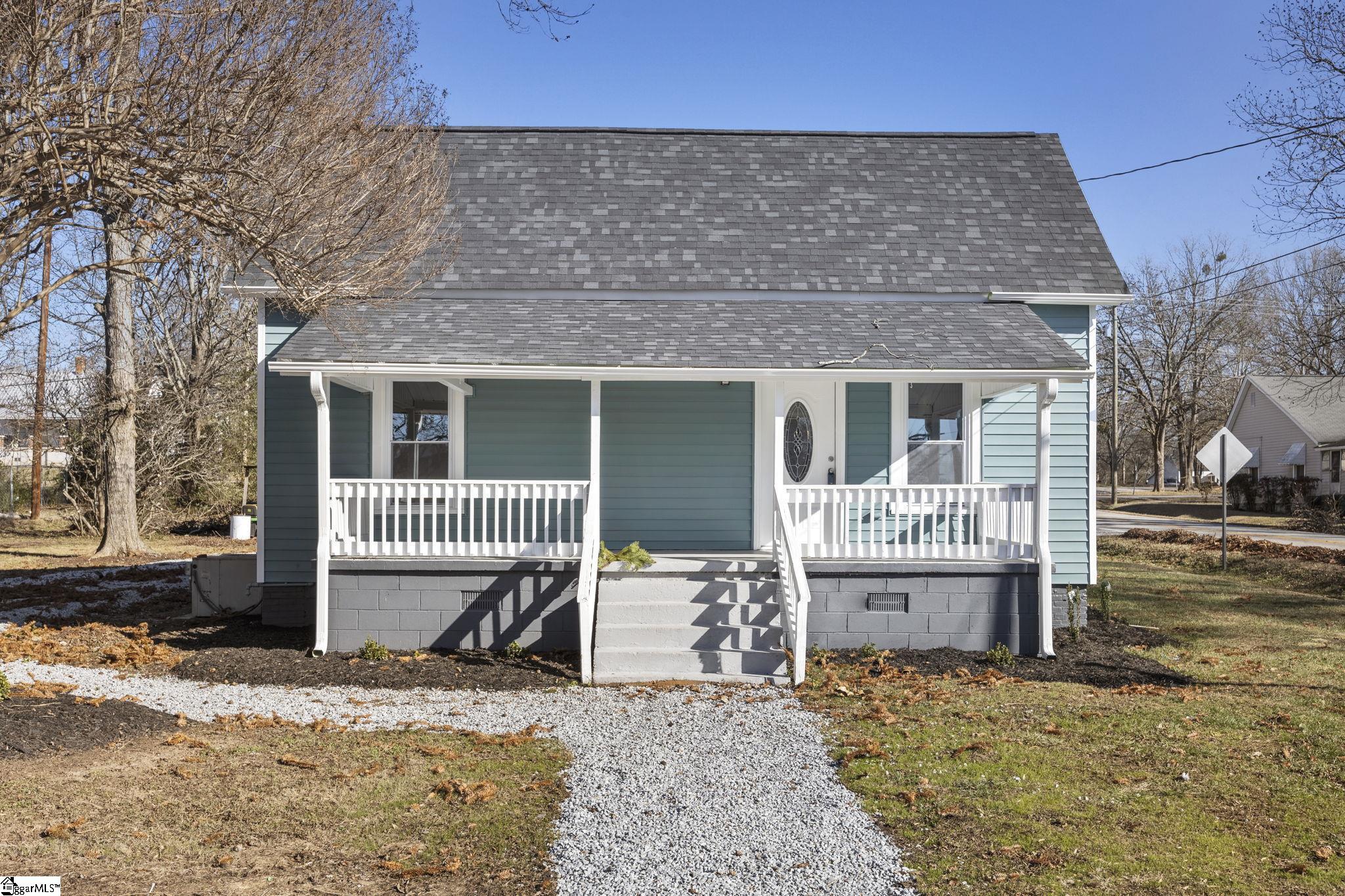 415 Blue Ridge Street Easley, SC 29640 - Photo 1 of 20 Covered front porch adds cozy living space.
