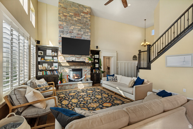 40 Wheeler Road Heber City, UT 84032 - Photo 8 of 41 Vaulted ceiling great room with a stone-clad fireplace and wood mantle