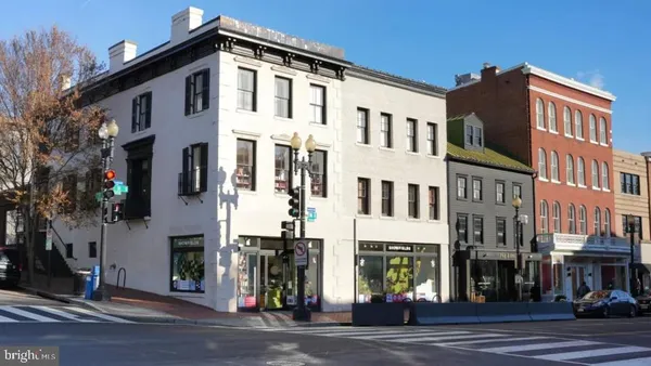 a front view of a building with a street