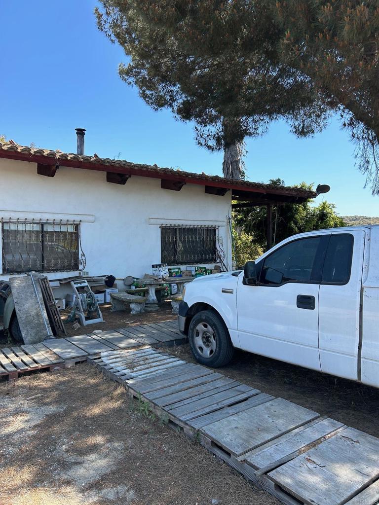 33444 Couser Canyon Road Valley Center, CA 92082 - Photo 11 of 11 a view of a car that has a car parked in it